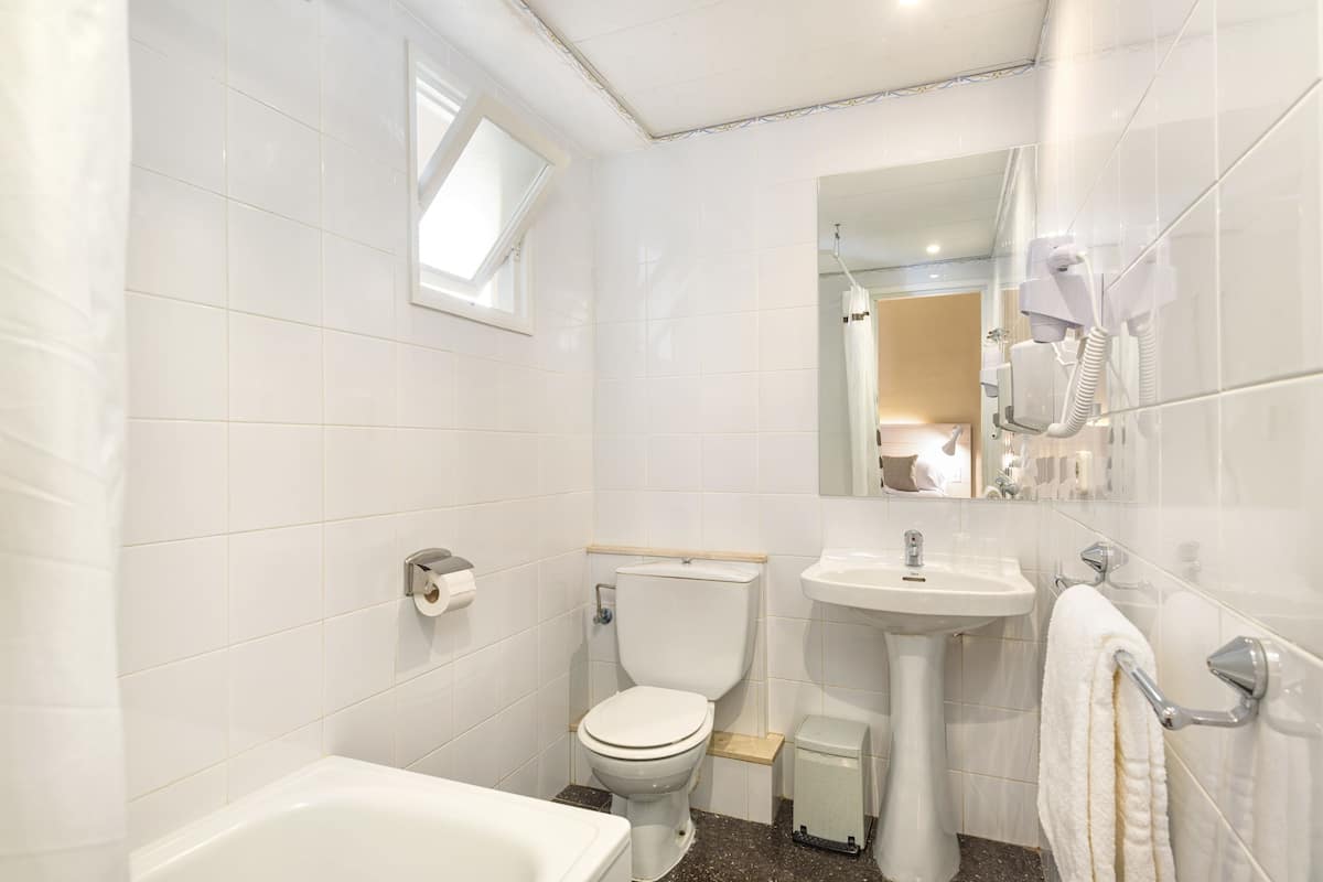 Shower, deep-soaking bathtub, hair dryer, towels