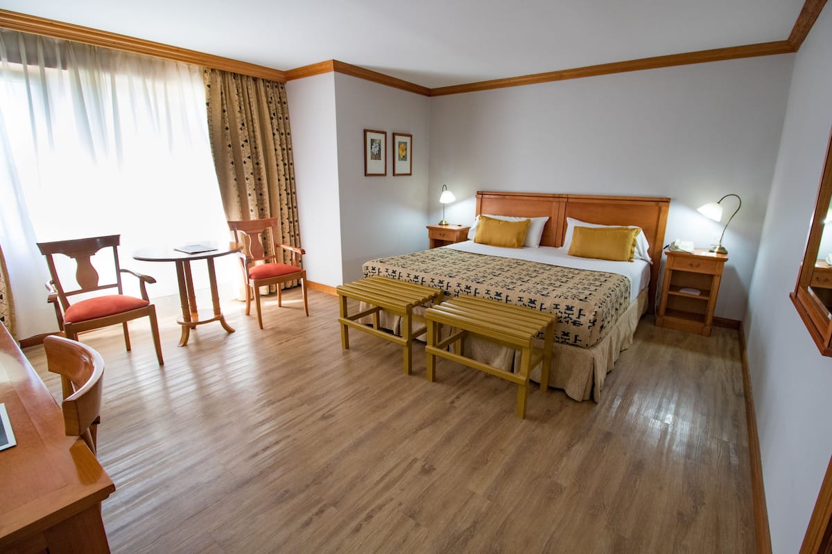 standard double room, 1 double or 2 single beds | minibar, in-room safe, desk, free cots/infant beds