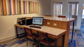 A modern office space with a desk, computer, printer, and chairs. - Holiday Inn Express & Suites Spencer by IHG (Spencer)