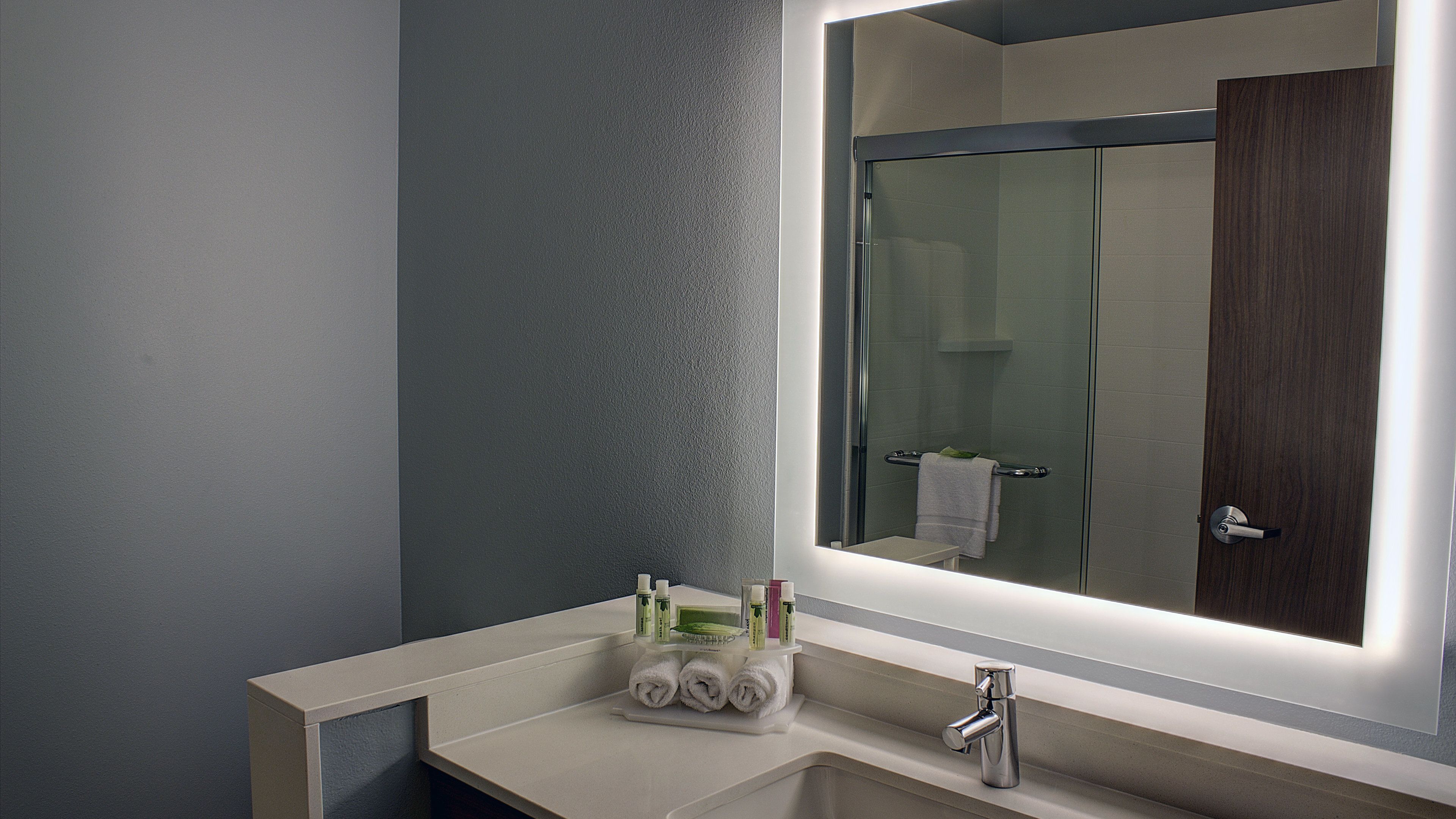 deep-soaking bathtub, designer toiletries, hair dryer, towels