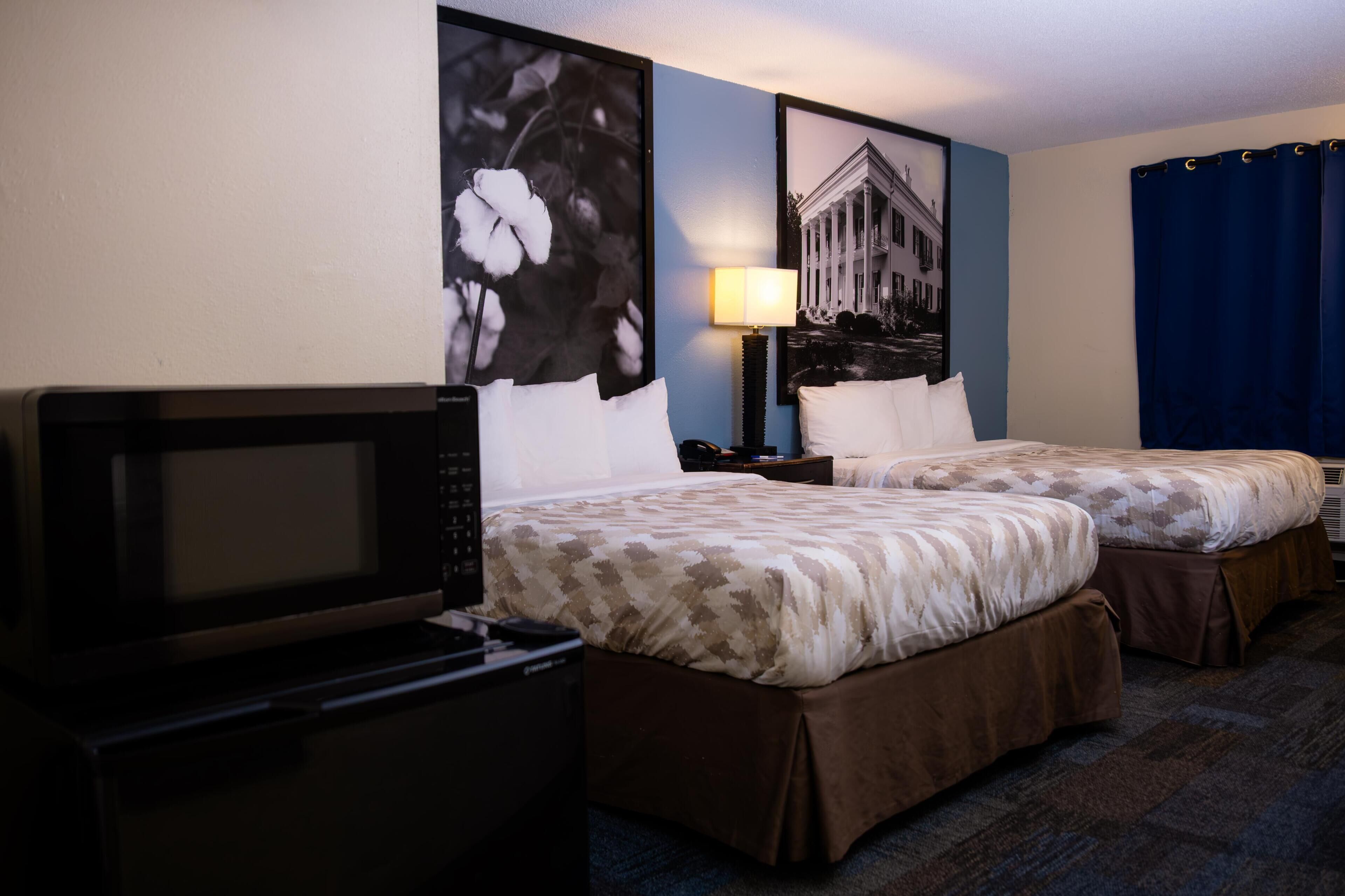 Premium bedding, desk, blackout drapes, iron/ironing board