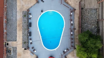 Seasonal outdoor pool, open 9 AM to 9 PM, pool umbrellas, sun loungers