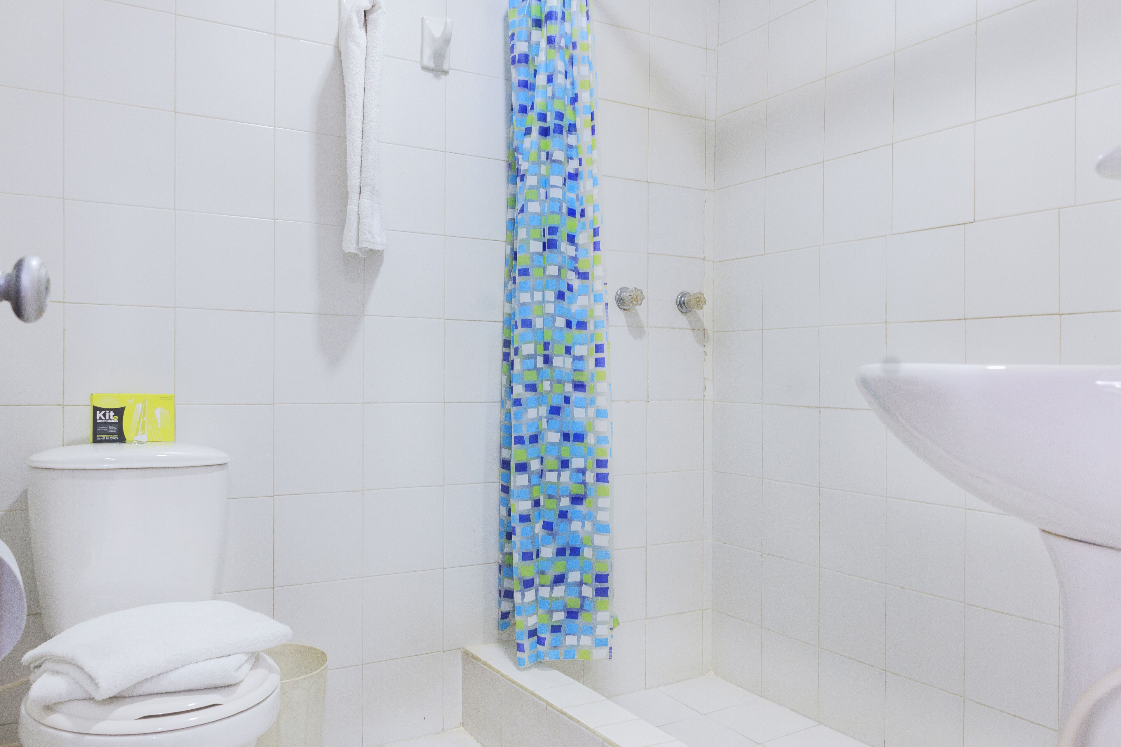 shower, rainfall showerhead, towels