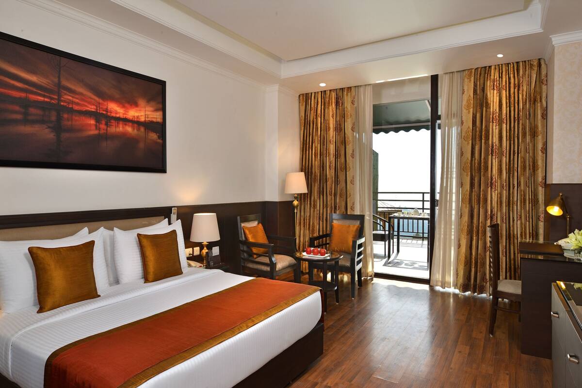 club room | minibar, in-room safe, desk, iron/ironing board