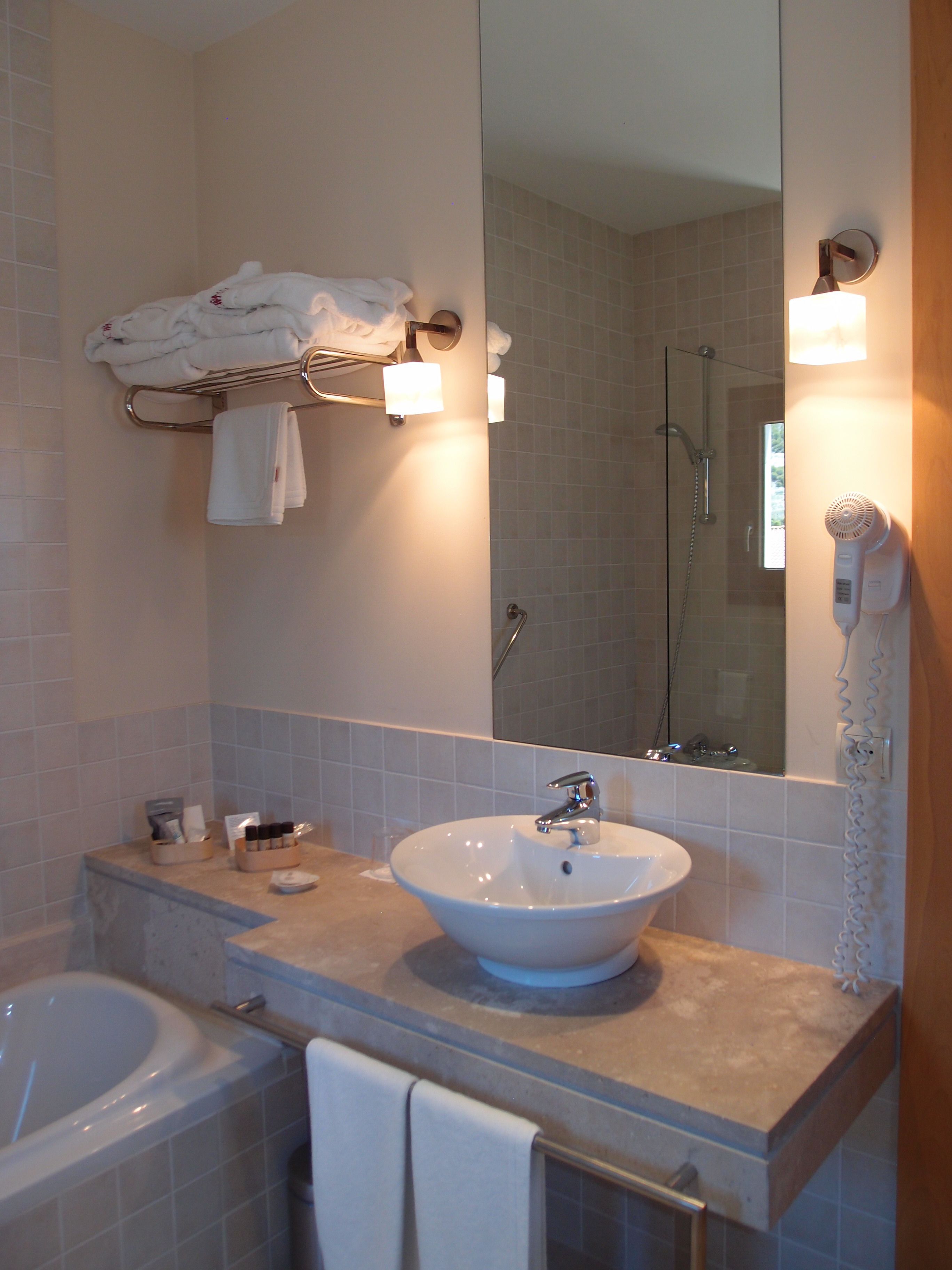 free toiletries, hair dryer, bidet, towels