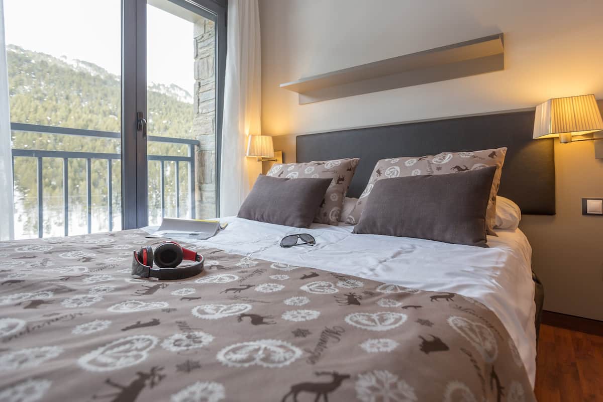 Apartment, 1 Bedroom (4 pax) | Blackout curtains, iron/ironing board, cots/infant beds, free WiFi