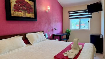 Chambre Exécutive, 1 trÚs grand lit, climatisation