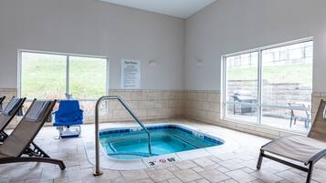 Indoor pool, pool umbrellas, sun loungers