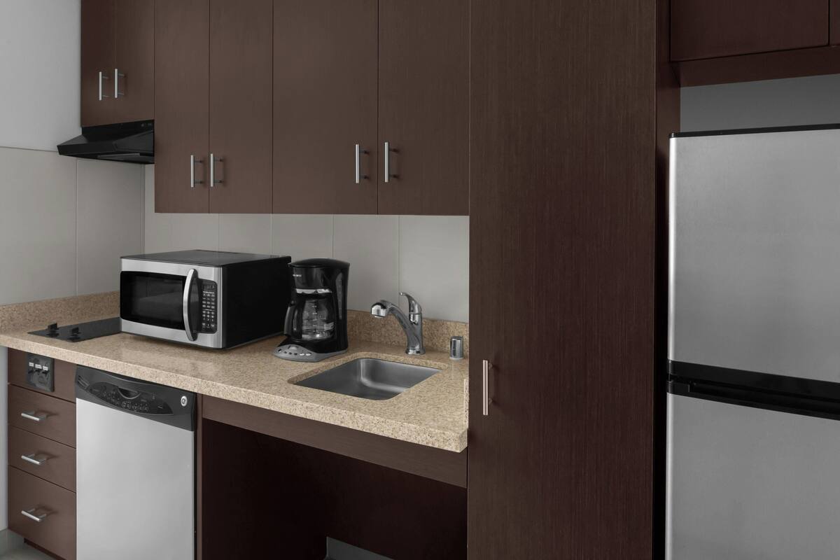 laptop workspace, blackout curtains, iron/ironing board