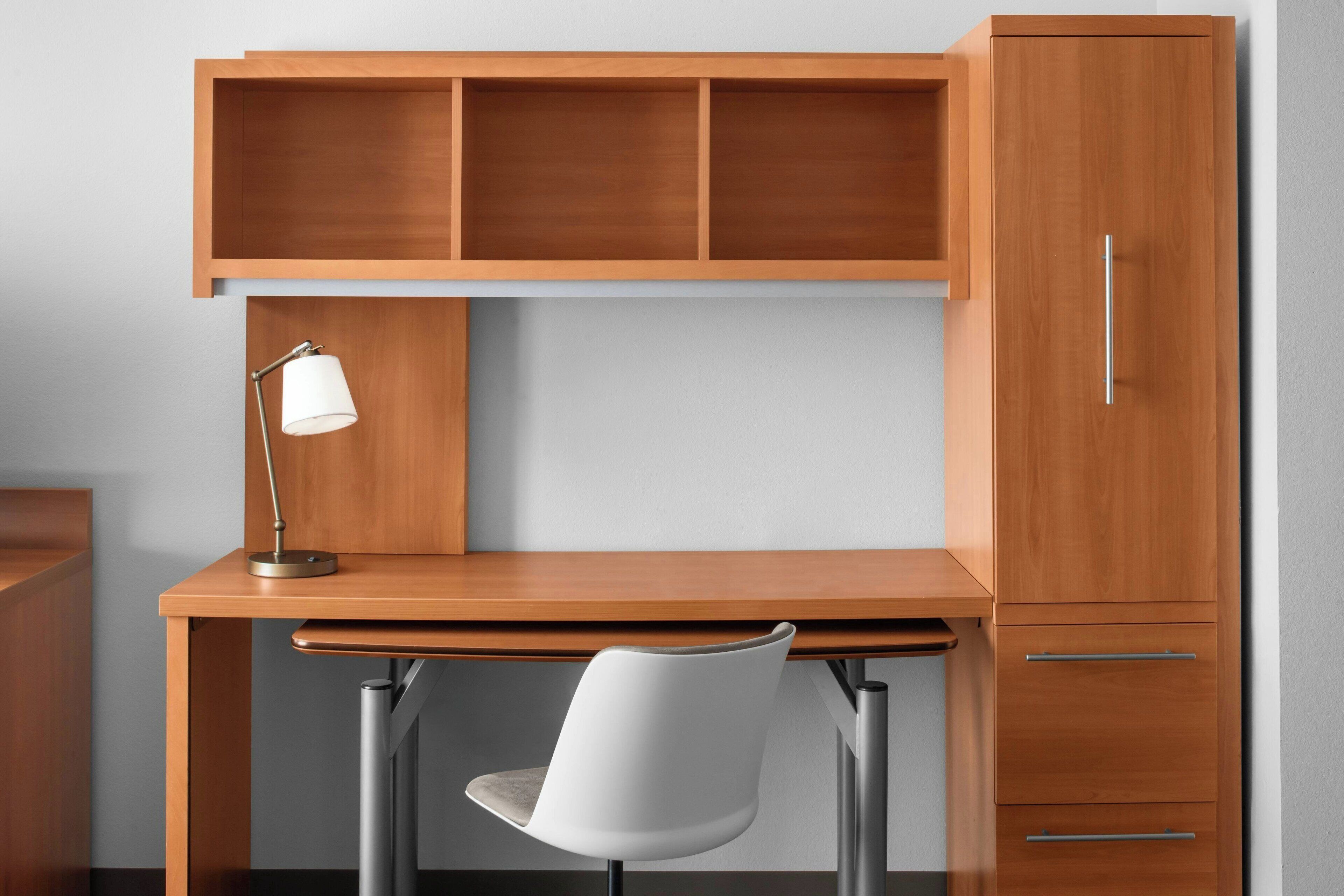 laptop workspace, blackout curtains, iron/ironing board