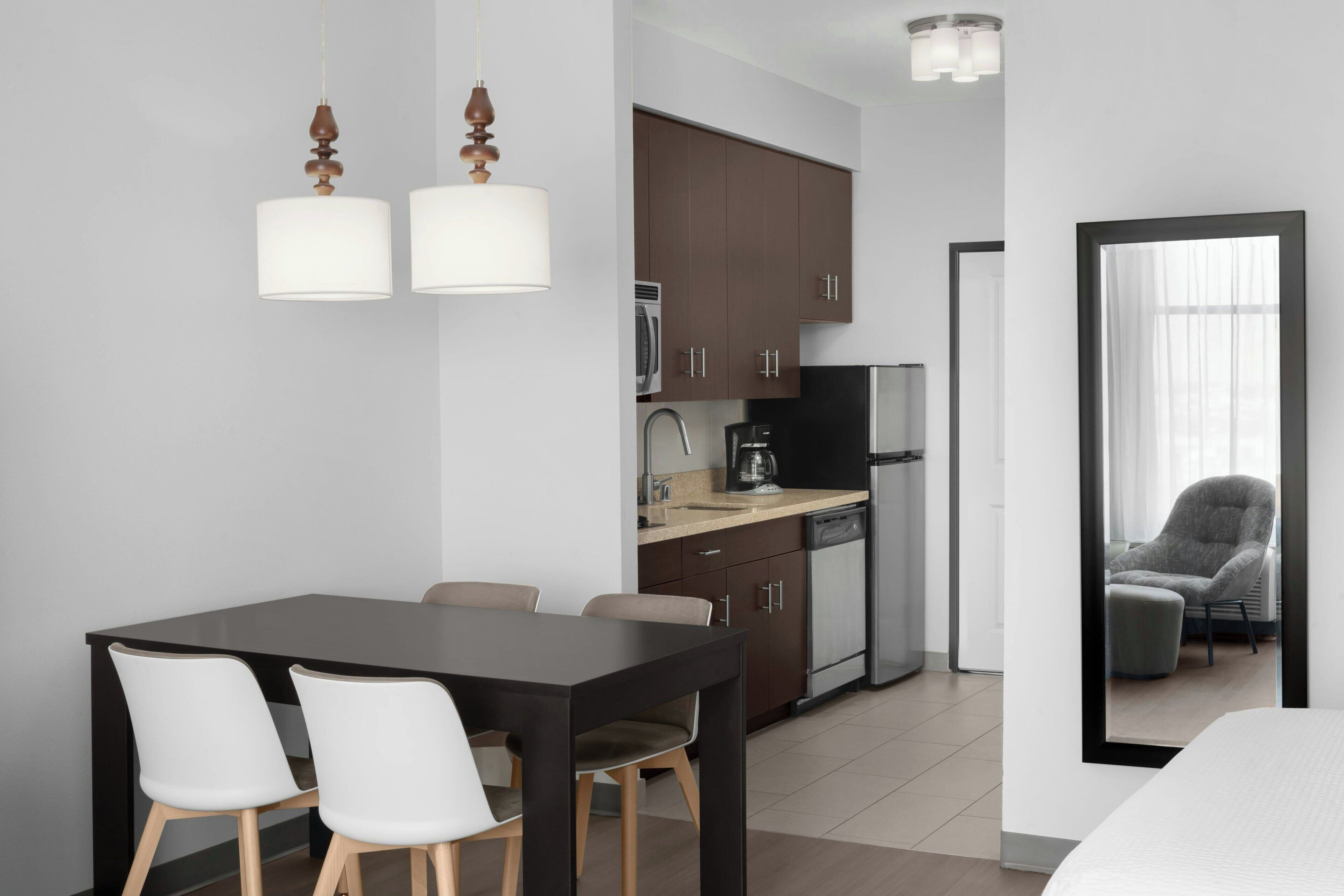 laptop workspace, blackout curtains, iron/ironing board