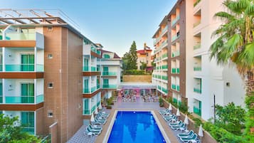 Outdoor pool, pool umbrellas, pool loungers