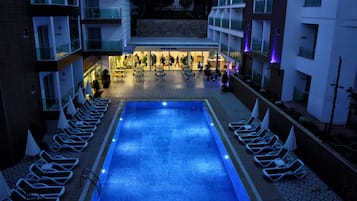 Outdoor pool, pool umbrellas, pool loungers
