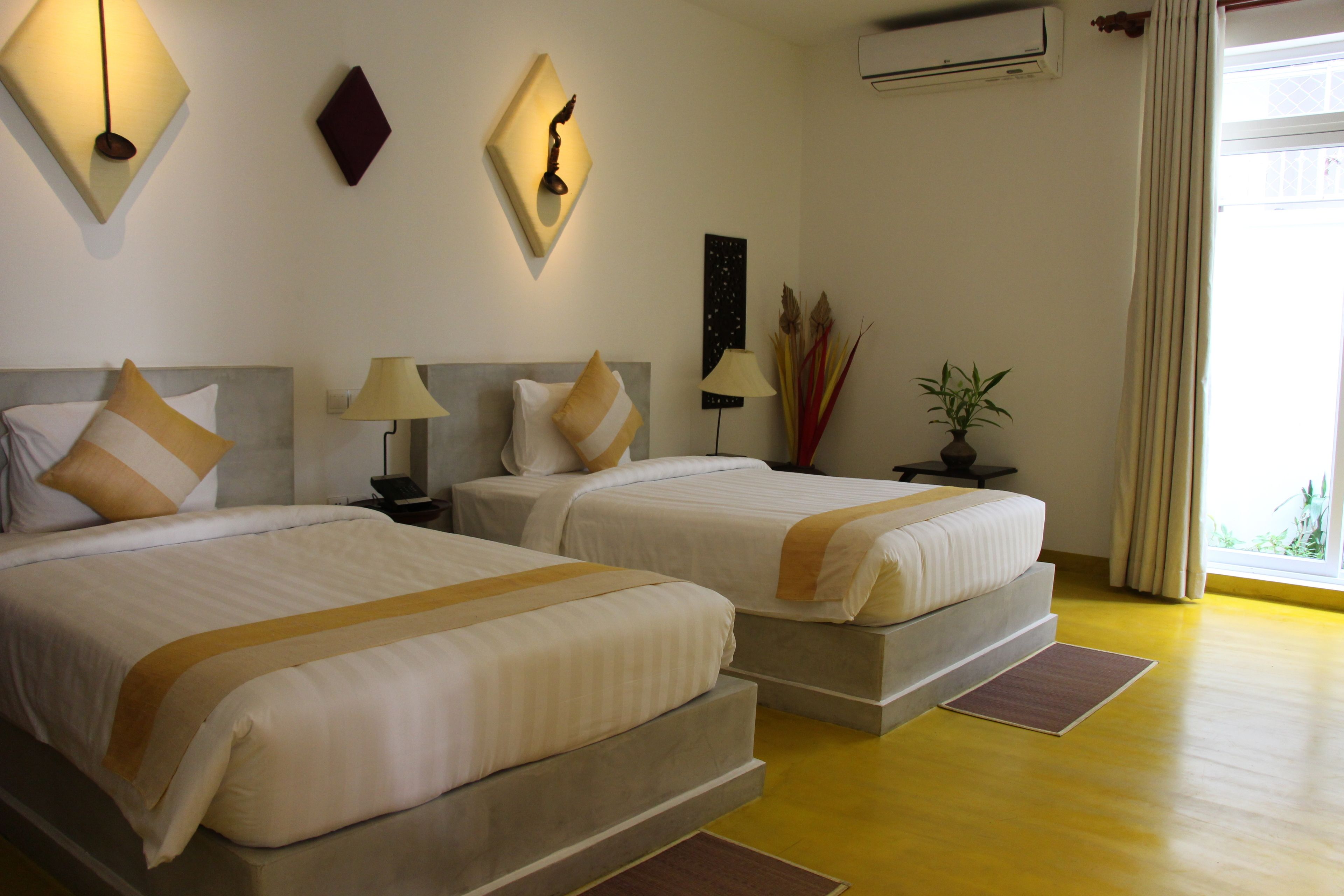 deluxe twin (02 single beds) | 1 bedroom, minibar, in-room safe, individually decorated