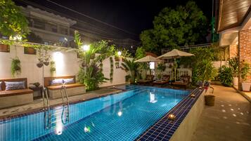 Outdoor pool, pool umbrellas, sun loungers