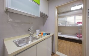 Twin Room | Private kitchenette | Fridge, microwave, electric kettle, cookware/dishes/utensils