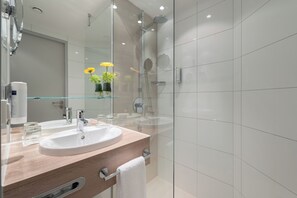Shower, free toiletries, hair dryer, towels