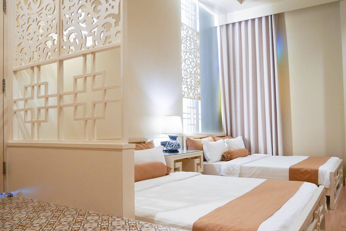 deluxe room - two double beds | hypo-allergenic bedding, in-room safe, desk, blackout curtains