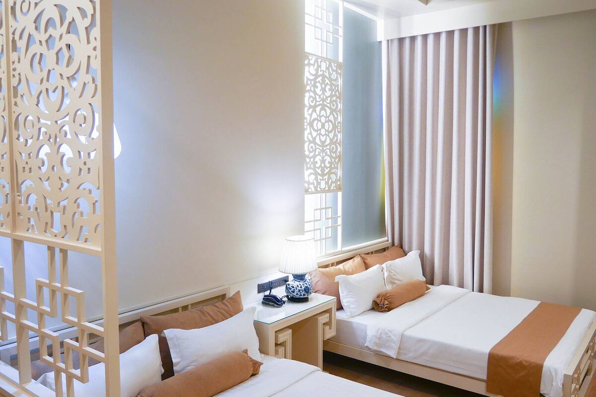 deluxe room - two double beds | hypo-allergenic bedding, in-room safe, desk, blackout curtains