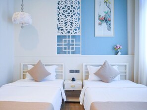 Superior Twin kamer | Hypoallergeen beddengoed, een kluis op de kamer, een bureau