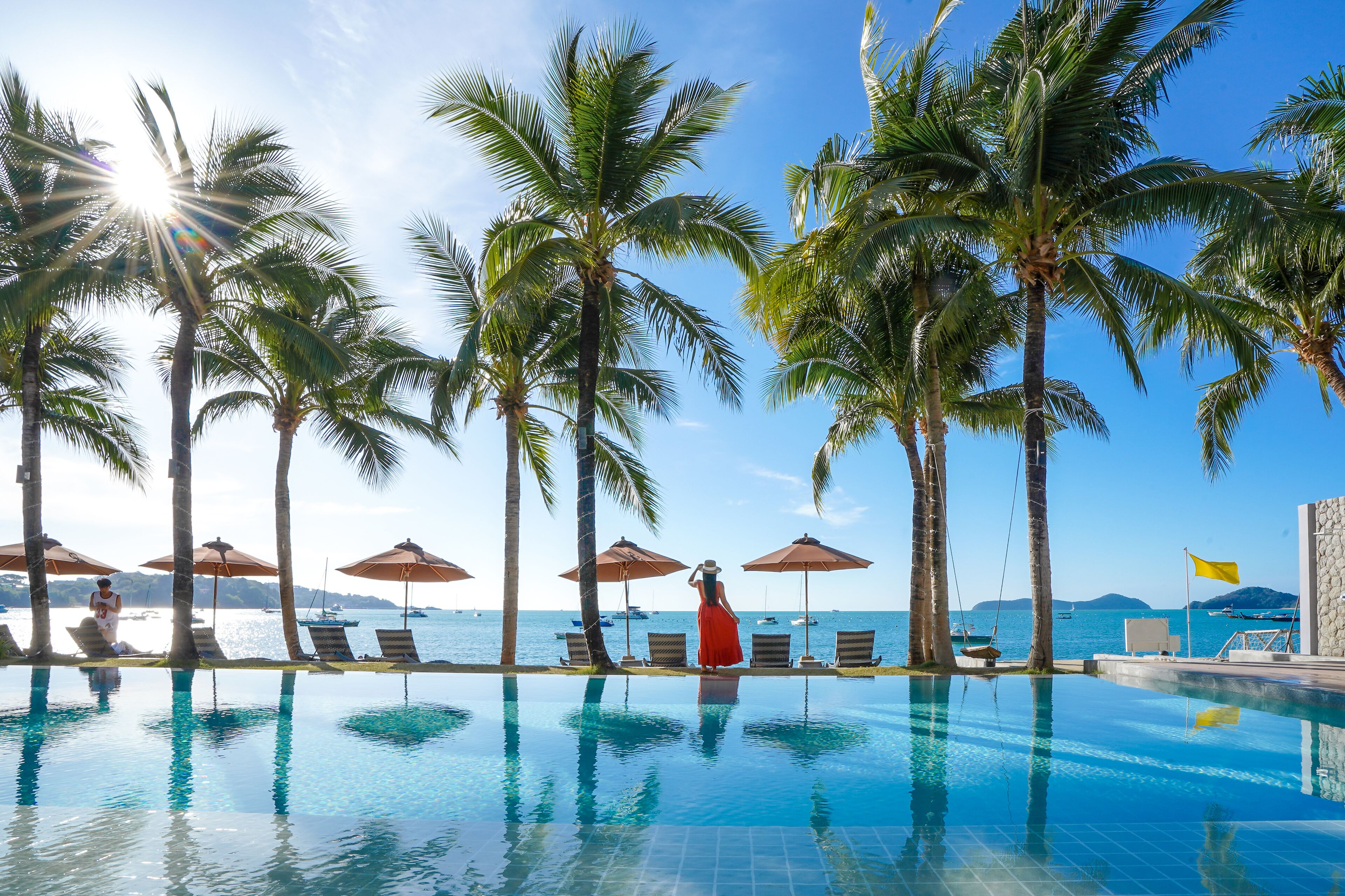 outdoor pool, pool umbrellas, pool loungers