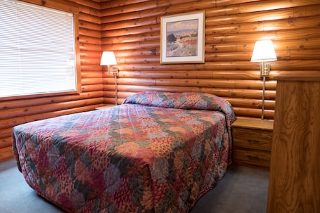 Cabin, 1 Bedroom | Bed sheets. Whispering Pines