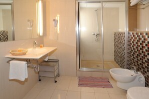 Hair dryer, bidet, towels