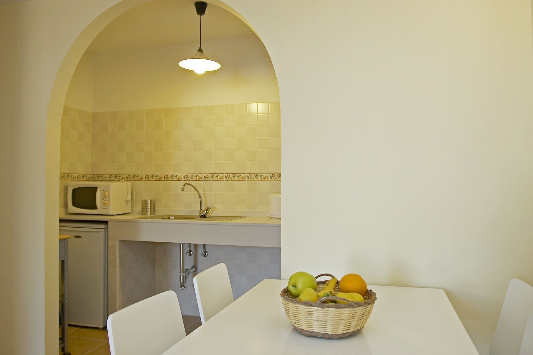 apartment, 1 bedroom, balcony | private kitchen | full-sized fridge, microwave, stovetop, coffee/tea maker