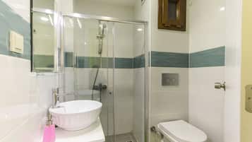 Shower, free toiletries, hair dryer, slippers