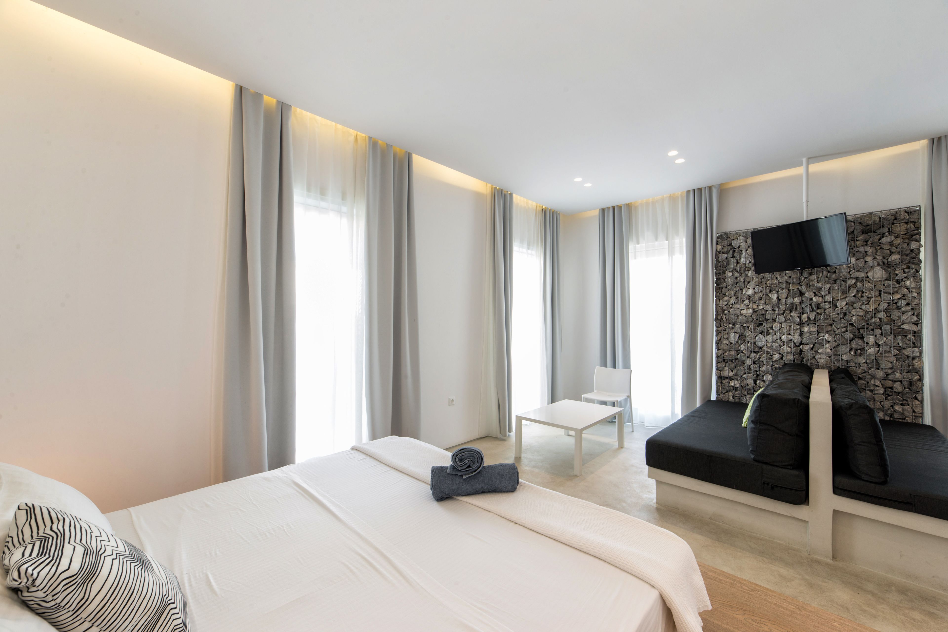 family room, garden view | 1 bedroom, premium bedding, minibar, in-room safe