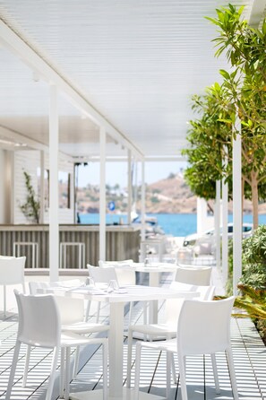 Breakfast, lunch, dinner served; Greek cuisine, beach views