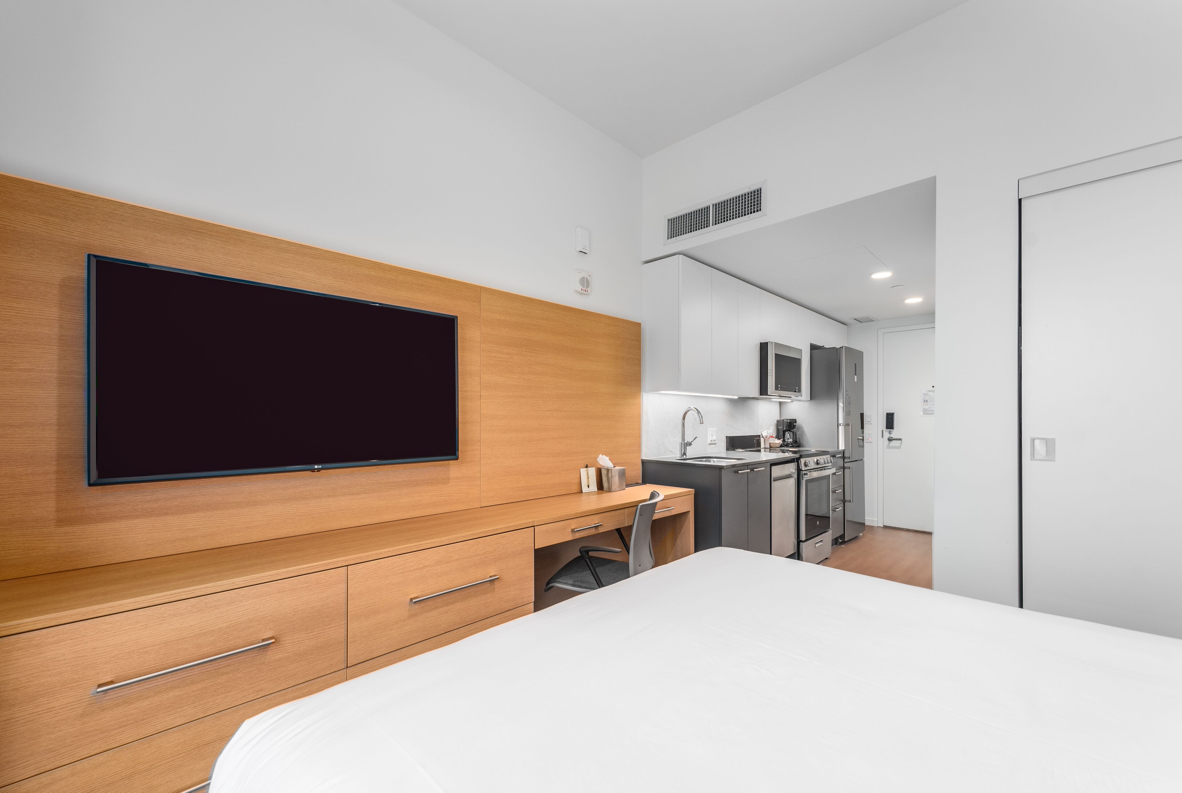 signature studio | 1 bedroom, desk, laptop workspace, blackout curtains