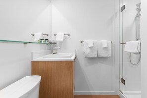 Signature Studio | Bathroom | Free toiletries, hair dryer, towels - Gage Suites at UBC (Vancouver)