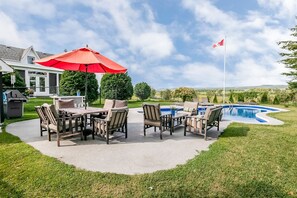 Outdoor pool, open 9:00 AM to 6:00 PM, pool umbrellas, pool loungers