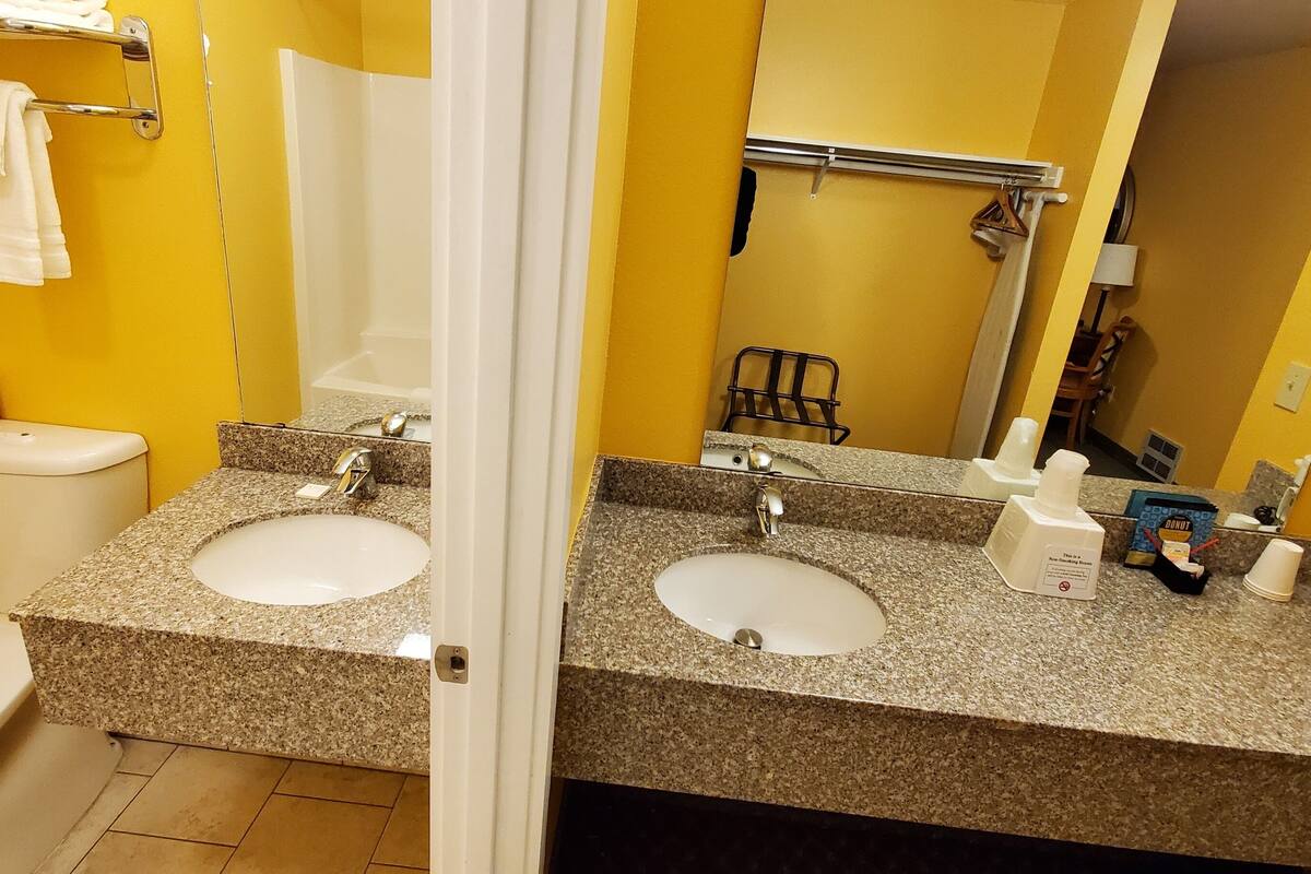 two double executive beds (no pets) | bathroom sink