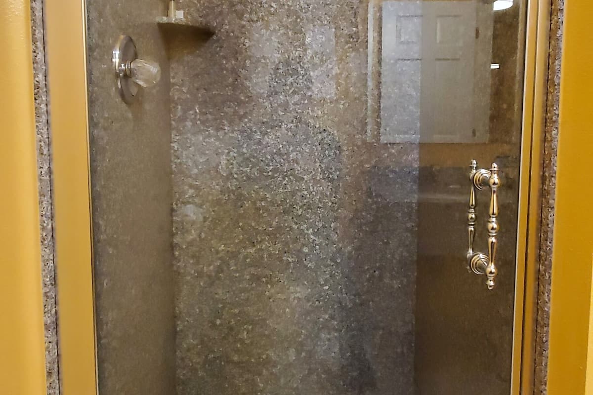 one king deluxe (no pets) | bathroom | free toiletries, hair dryer, towels