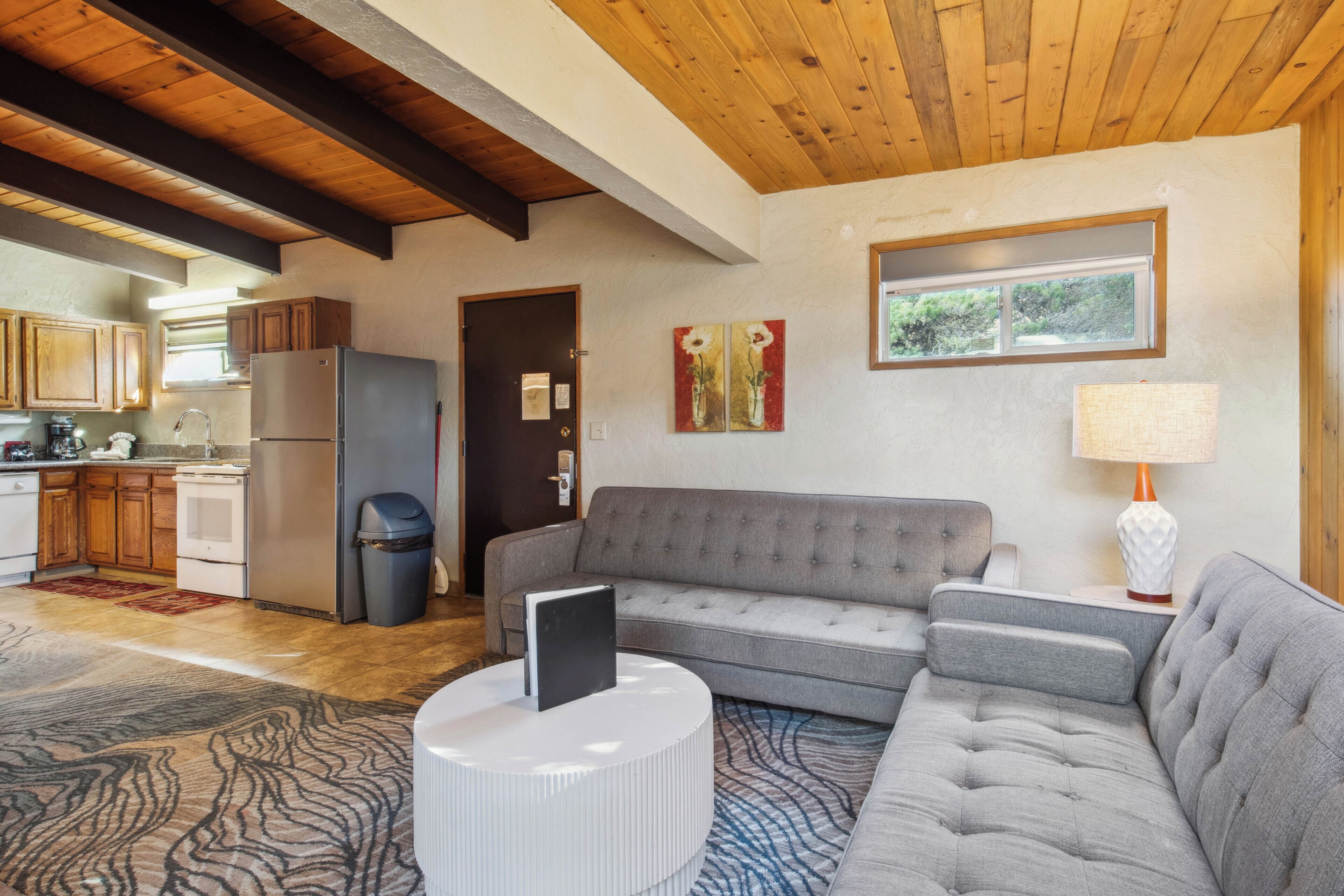 two bedroom suite kitchen pet friendly | living area | flat-screen tv