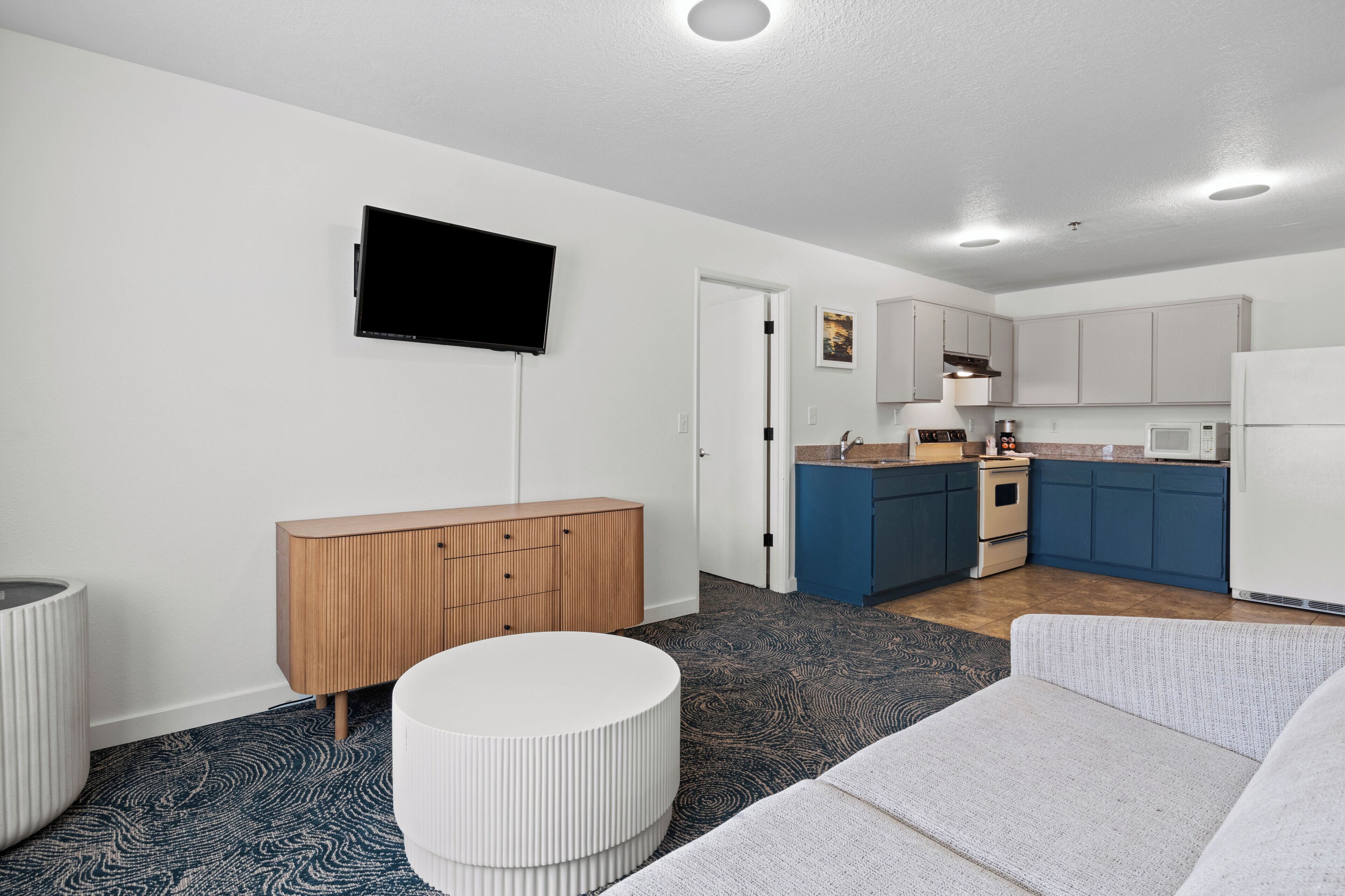 1 bedroom suite kitchen hillside view | 1 bedroom, laptop workspace, iron/ironing board, cots/infant beds