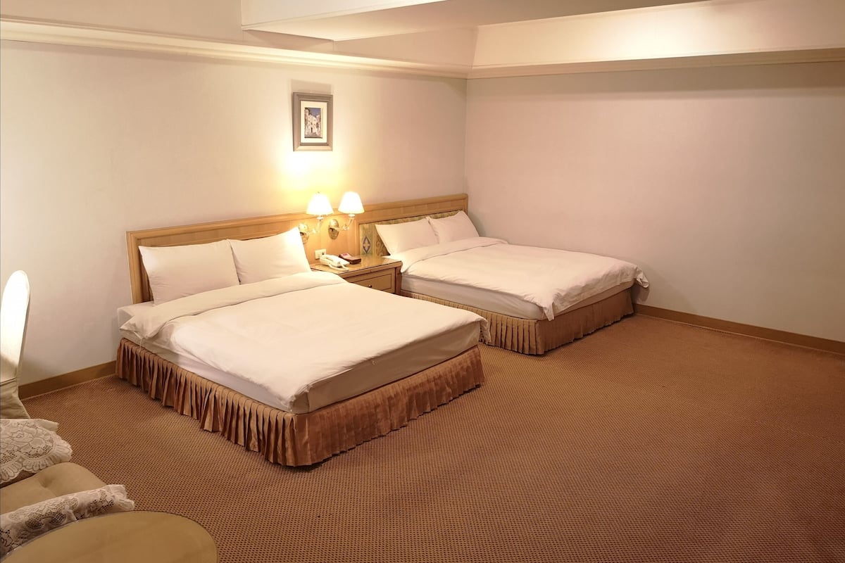 Standard Quadruple Room, No Windows | In-room safe, desk, laptop workspace, blackout drapes