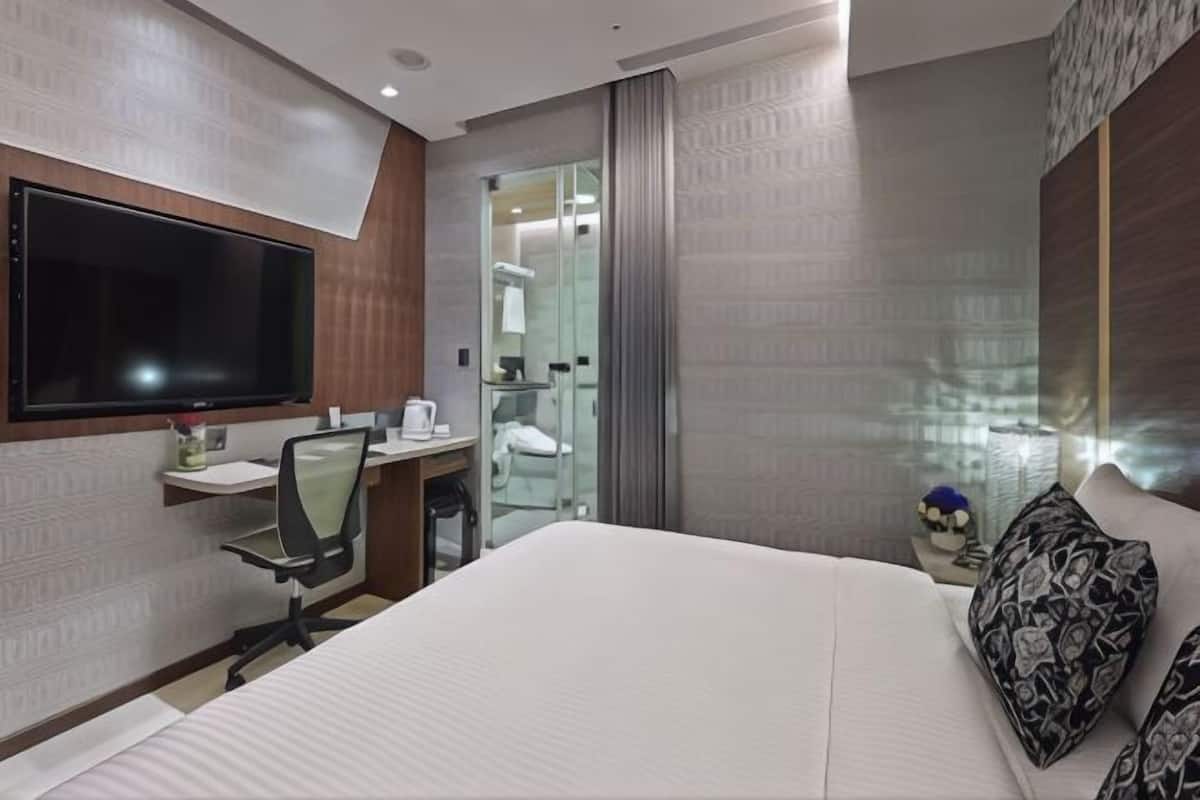 Copriletto in piuma, minibar con snack e bevande gratuite