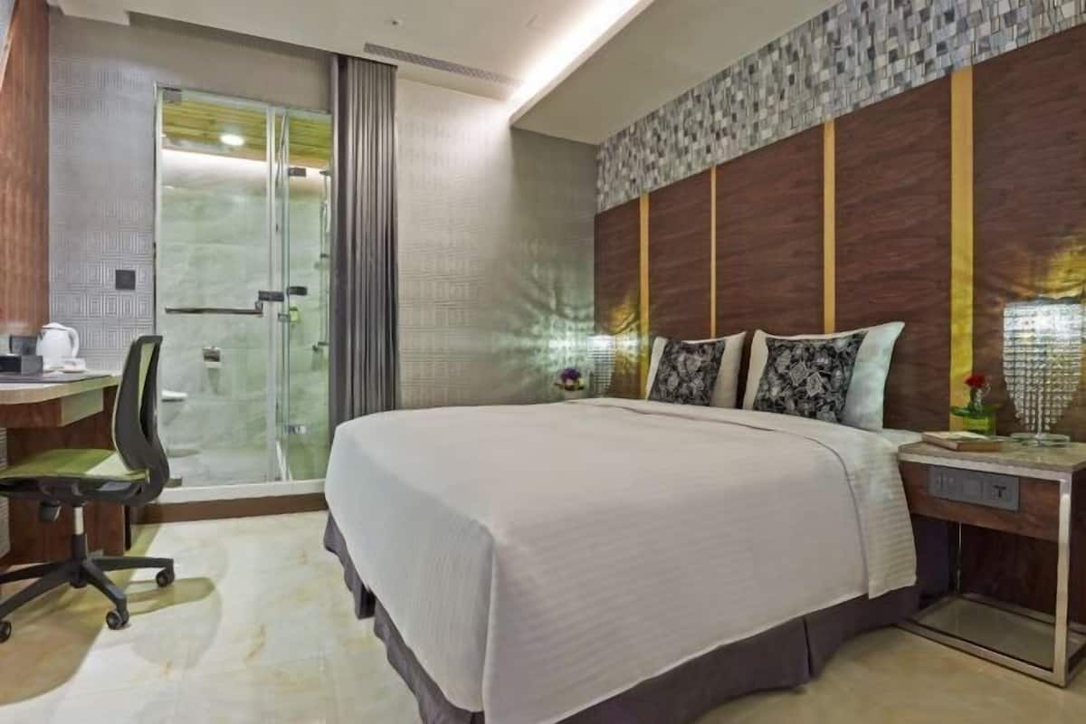 Copriletto in piuma, minibar con snack e bevande gratuite