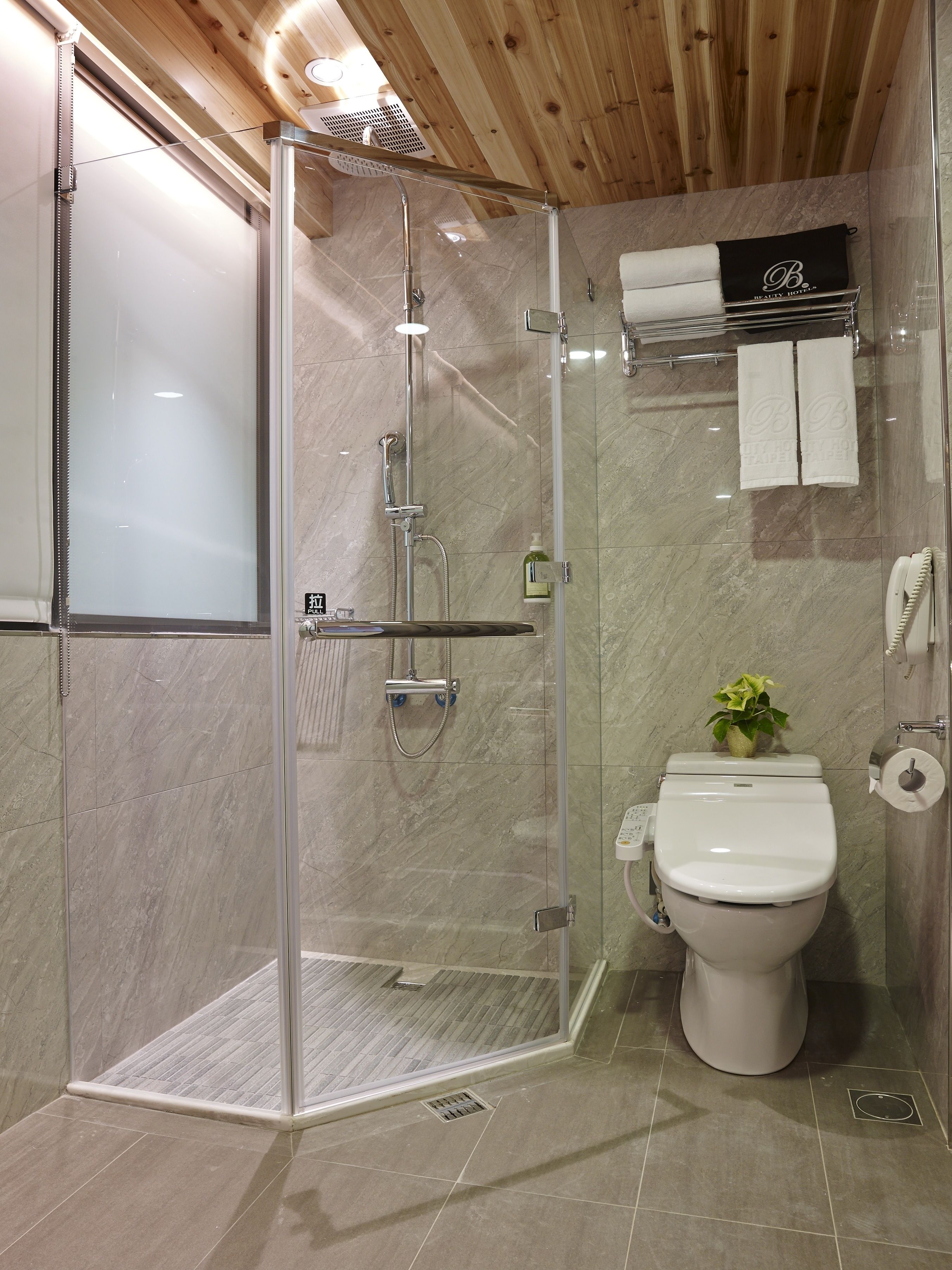 hair dryer, slippers, bidet, towels