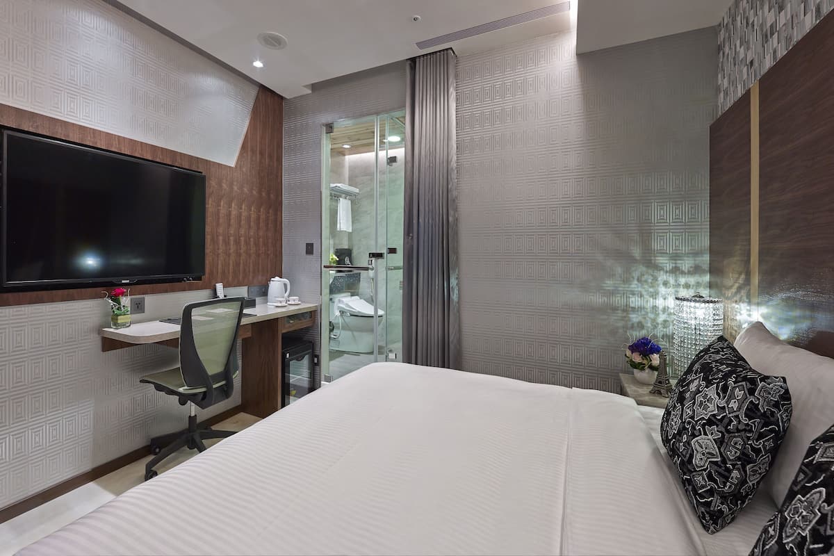 Copriletto in piuma, minibar con snack e bevande gratuite