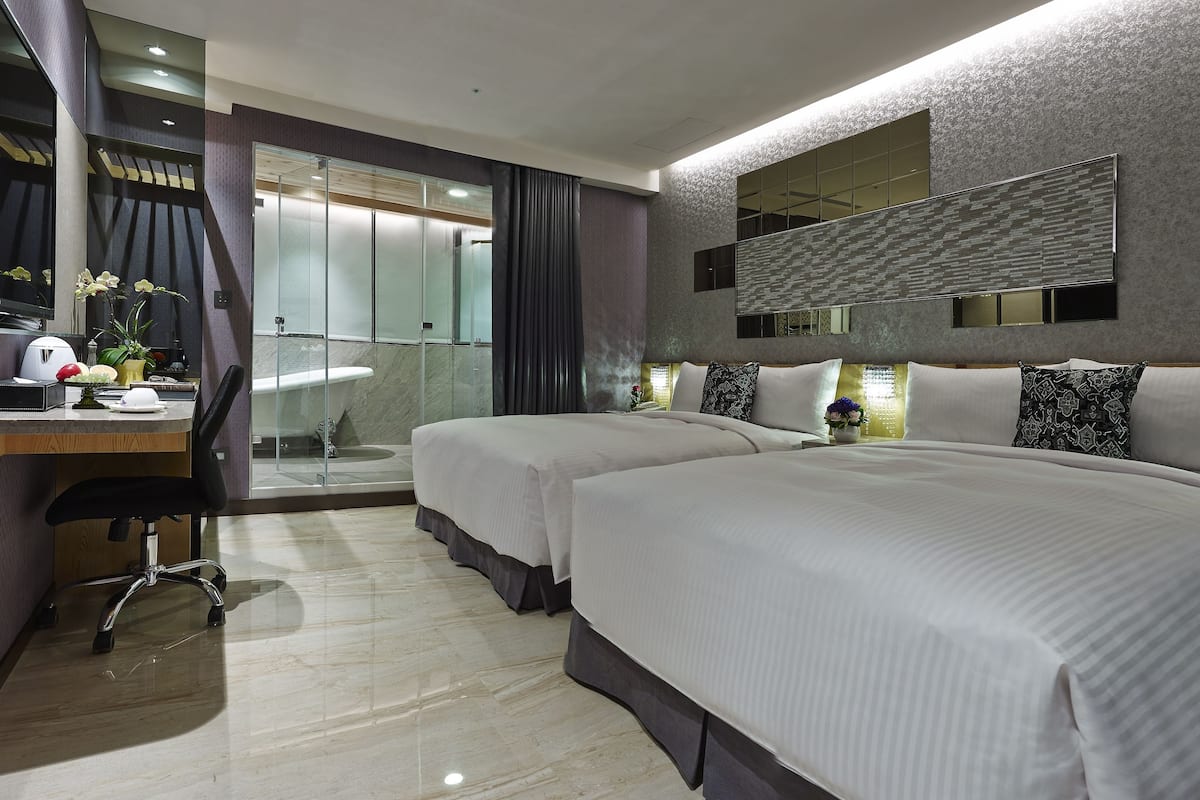 Quadrupla Superior (無人櫃檯) | Copriletto in piuma, minibar con snack e bevande gratuite