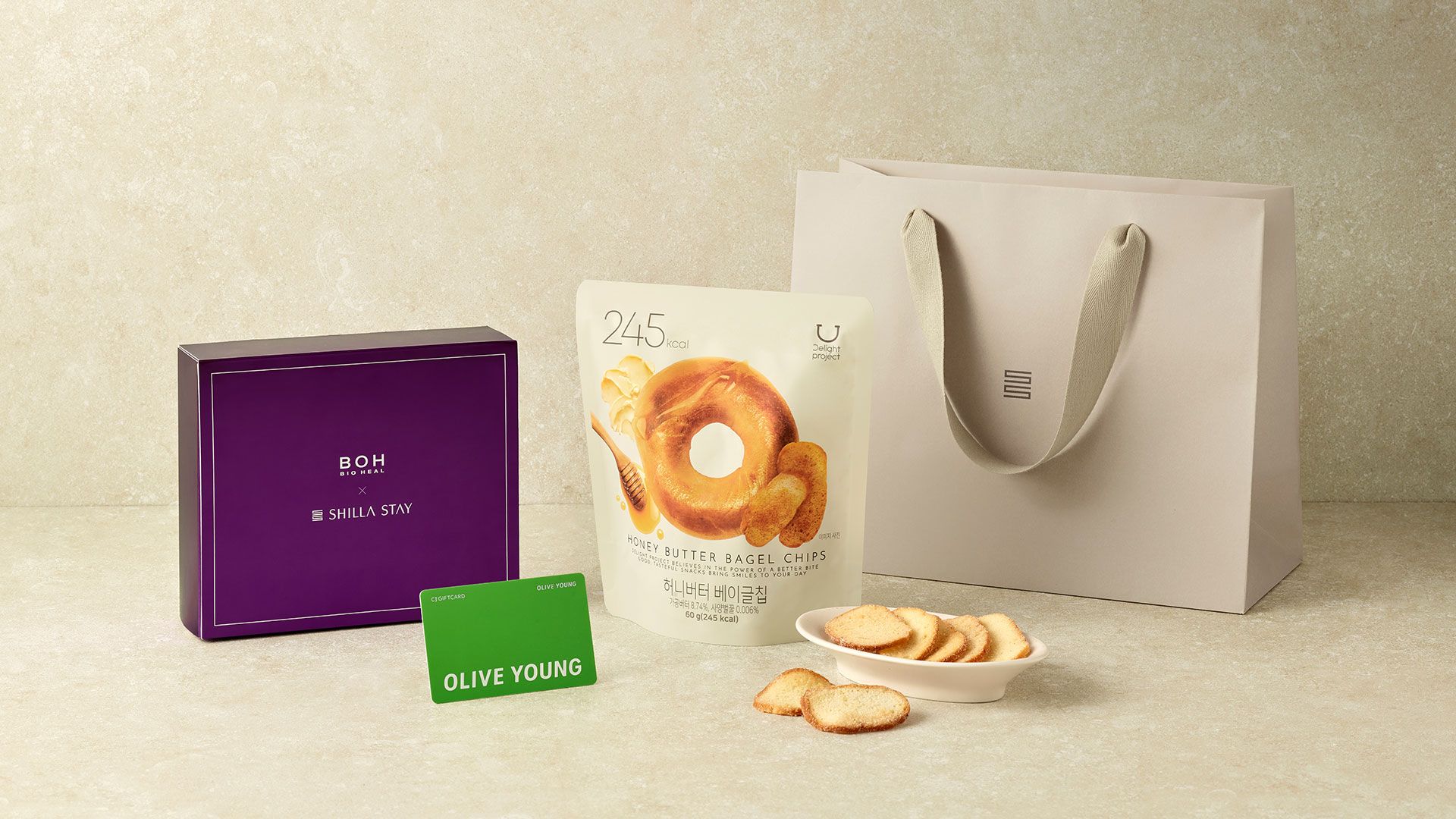 A purple box labeled 'BOH BIOHEAL' and a white bag with a handle.