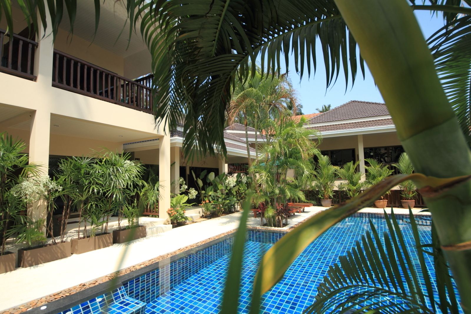 2 outdoor pools, pool umbrellas, pool loungers