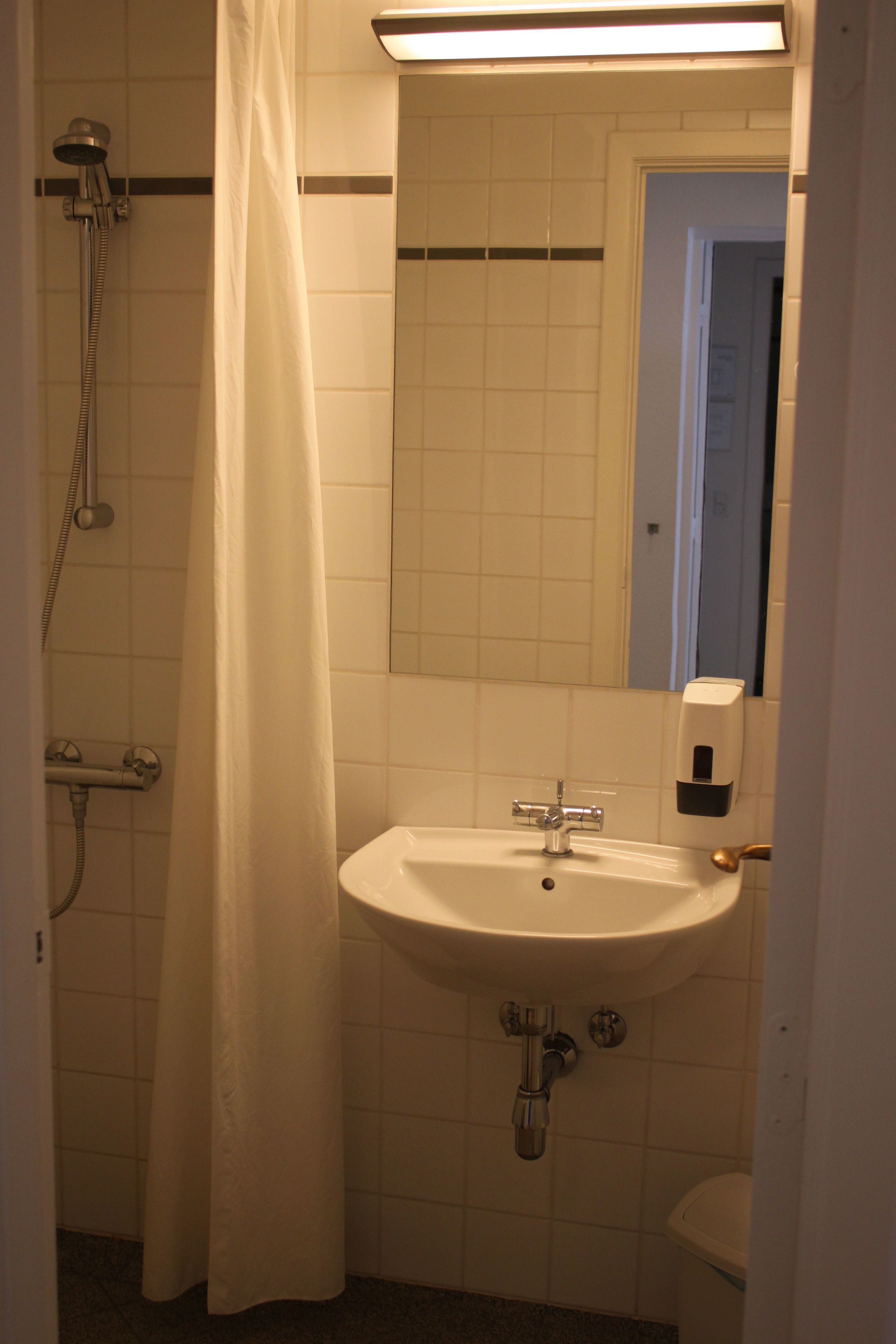 shower, eco-friendly toiletries, hair dryer, towels