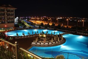 Indoor pool, seasonal outdoor pool, pool umbrellas, pool loungers