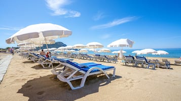 Private beach nearby, free beach shuttle, beach cabanas, sun loungers
