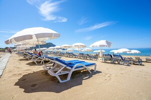 Private beach nearby, free beach shuttle, beach cabanas, sun loungers